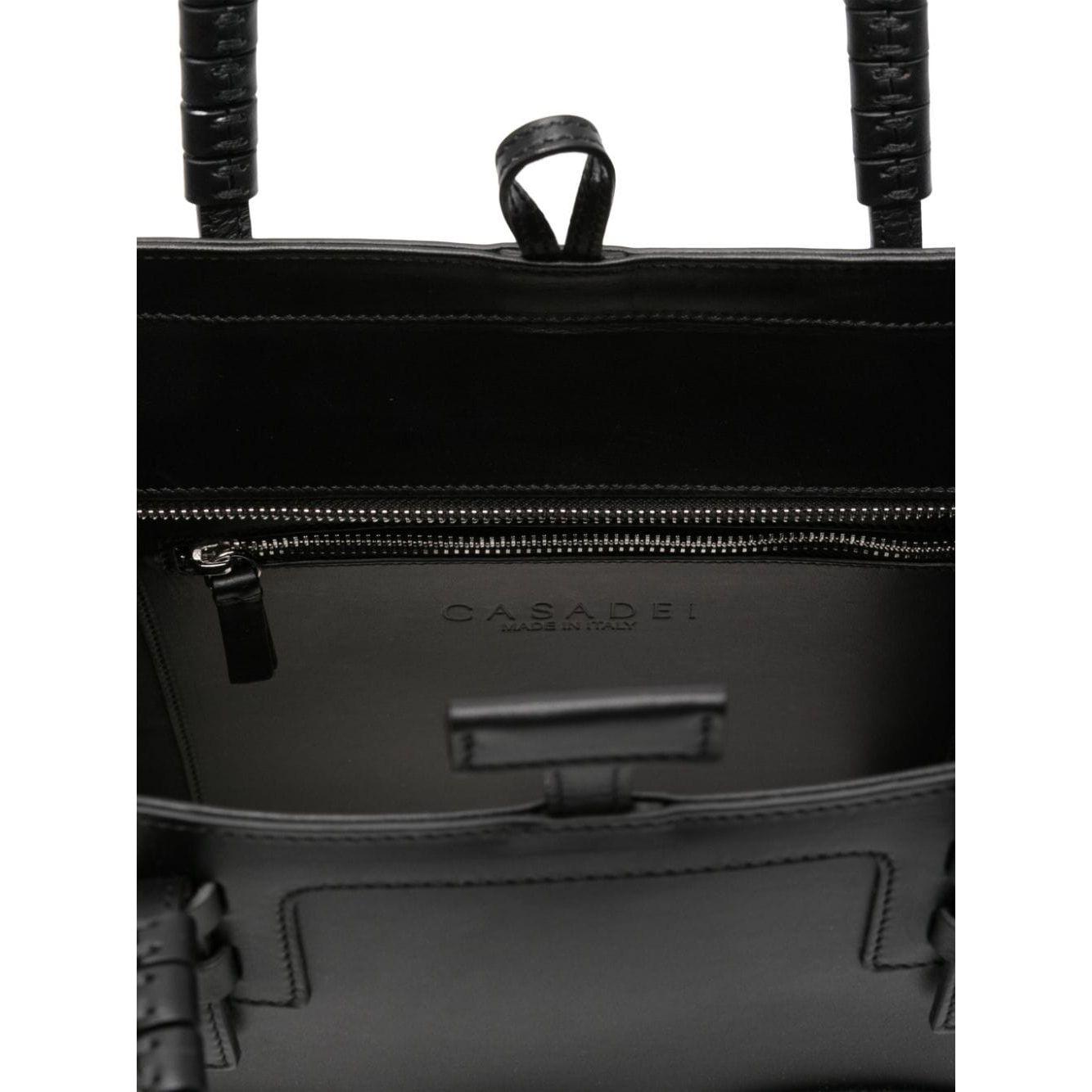 Front view with bag zipped and handles upright.