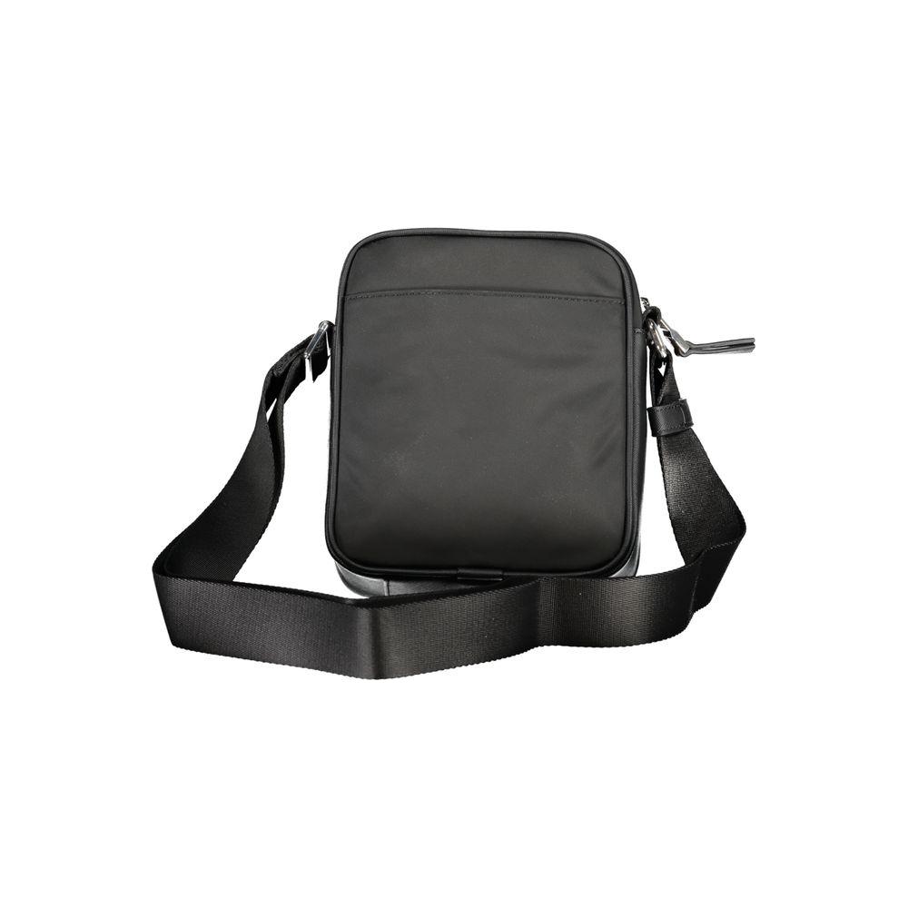 Front view with bag zipped and handles upright.