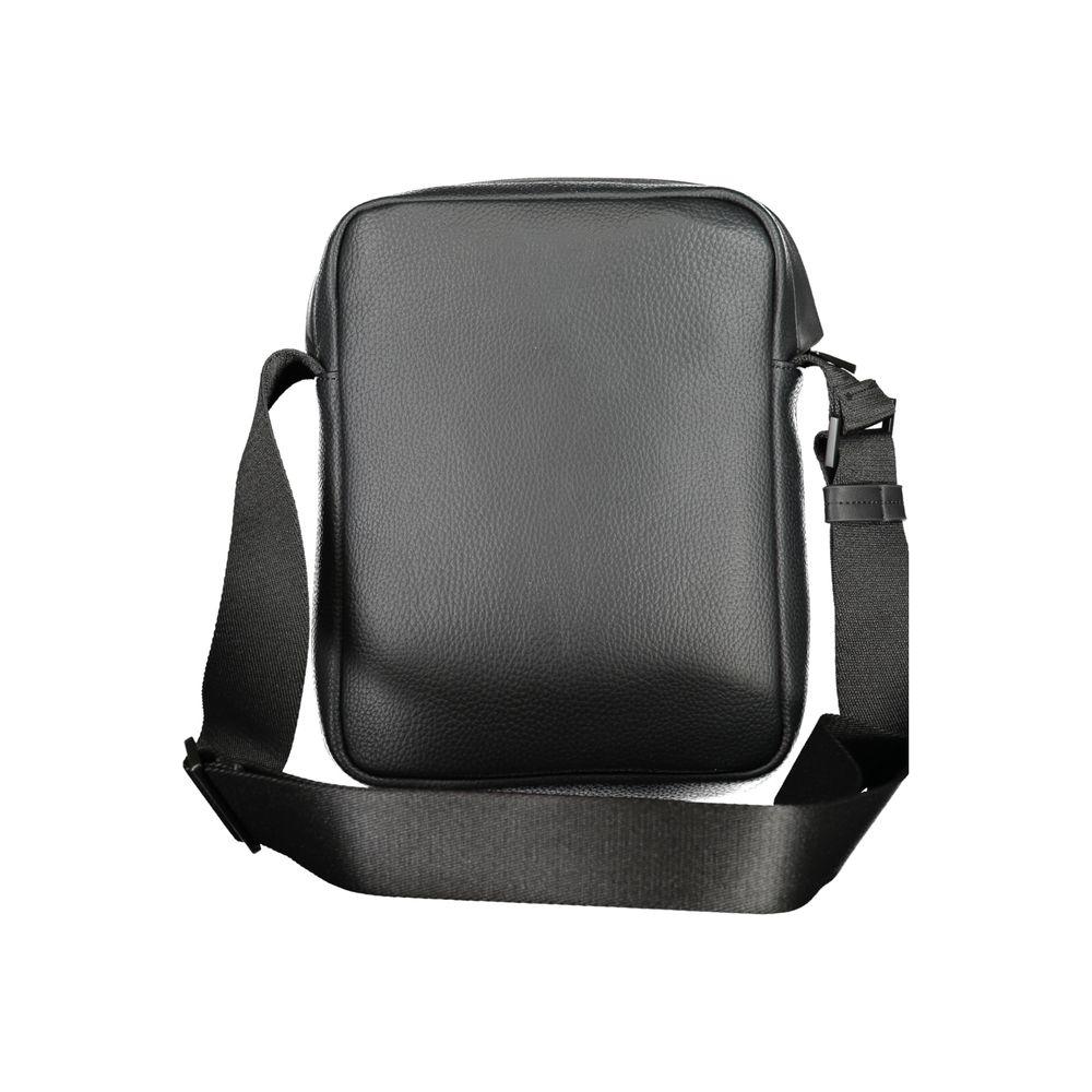 Front view with bag zipped and handles upright.