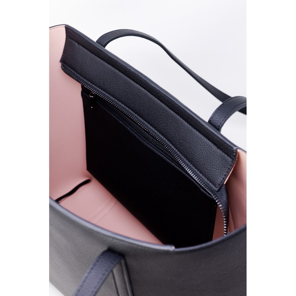 Front view with bag zipped and handles upright.